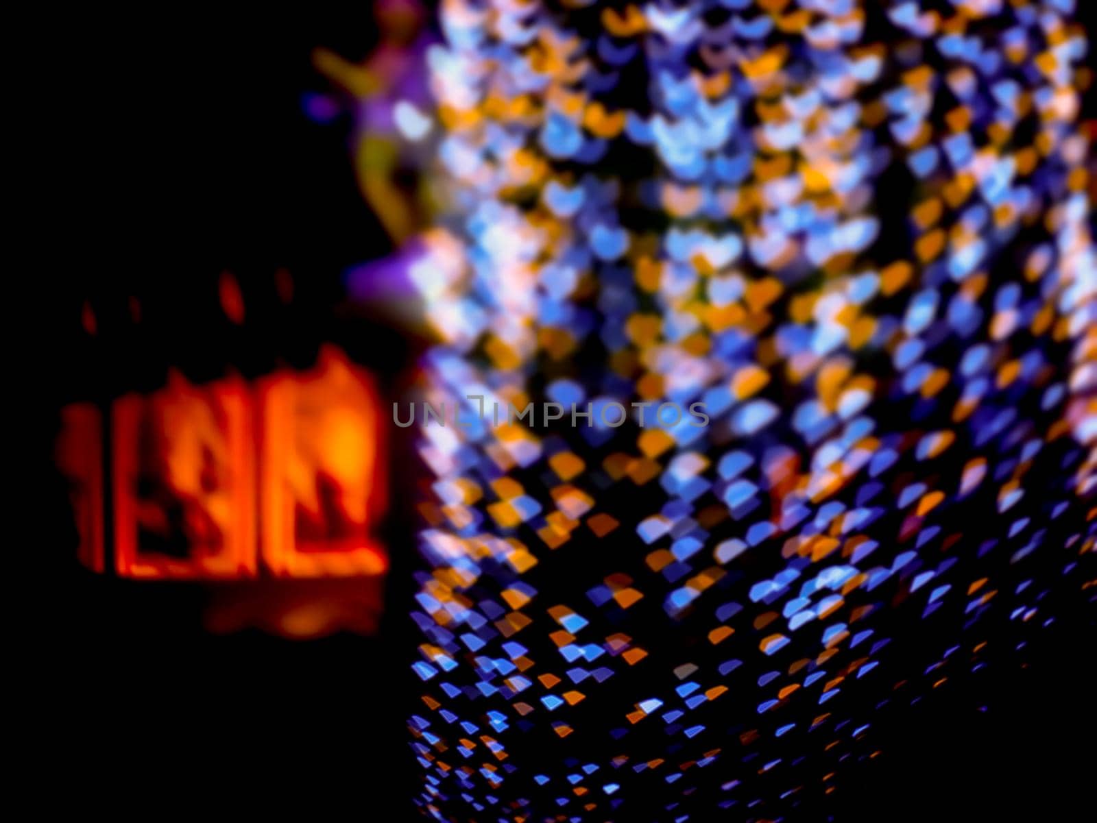 orange blue blur heart shape love night light on tree in garden by Darkfox