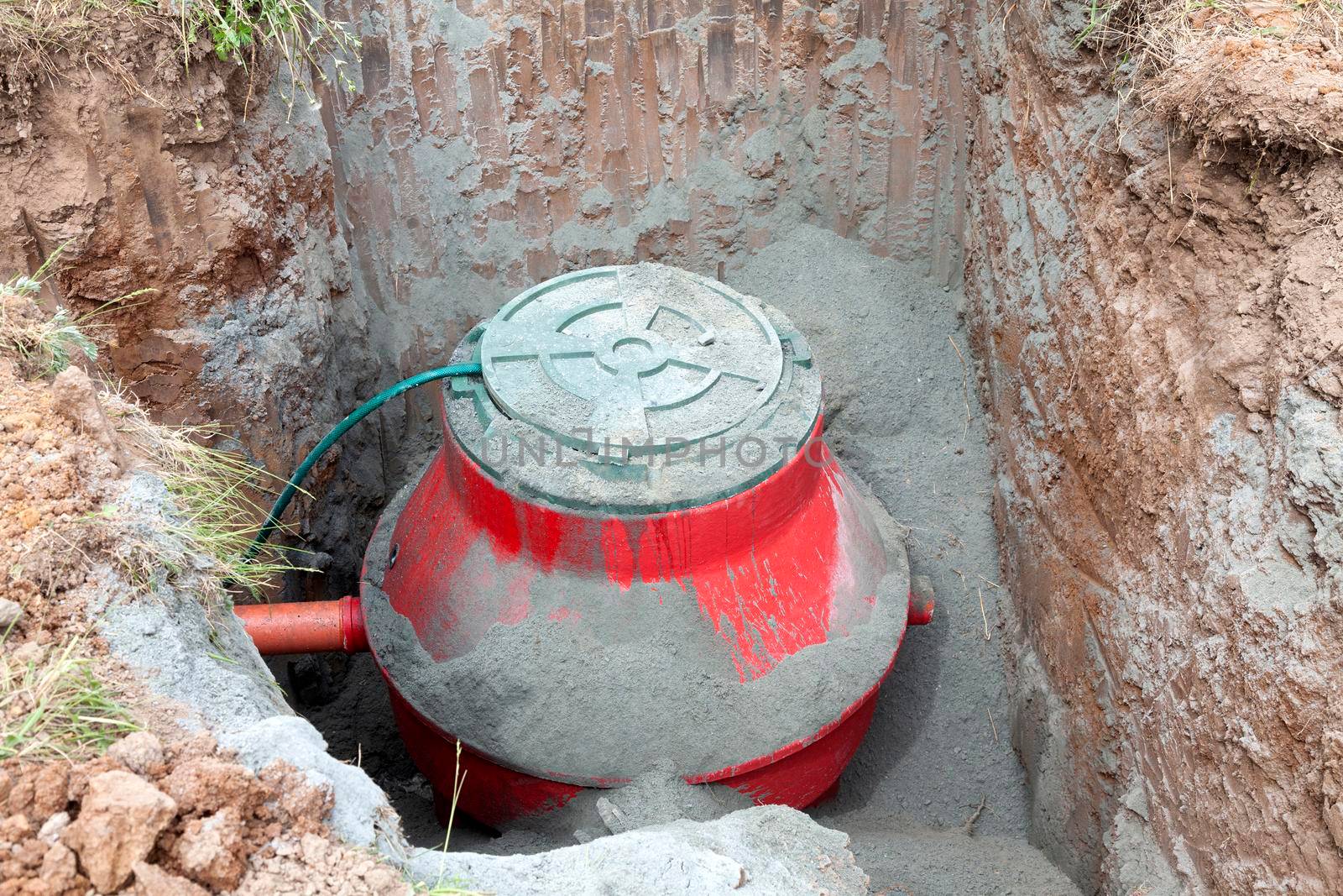 Installation of underground tank for sewage system