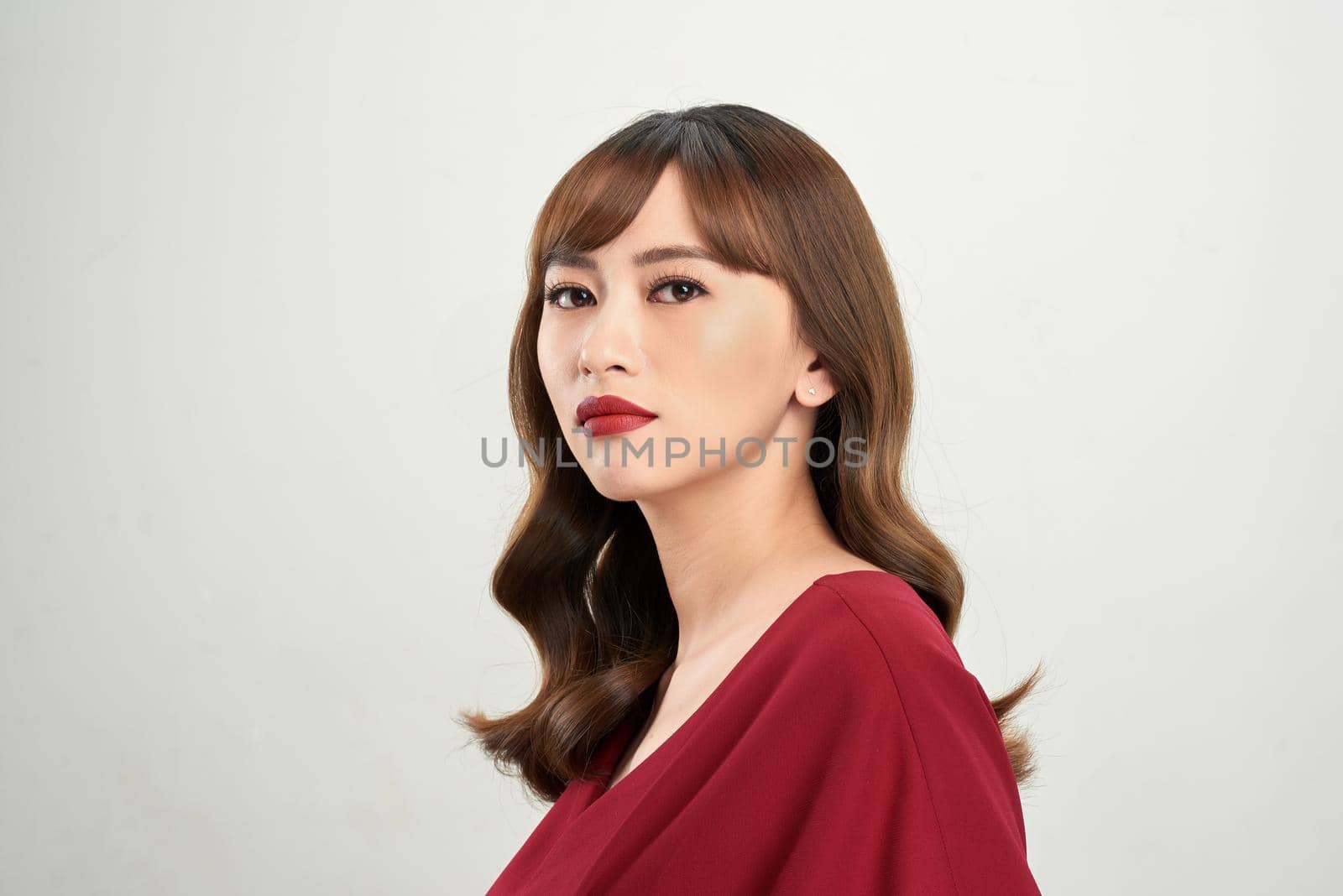 Asian beautiful woman with red lipstick isolated on white background.