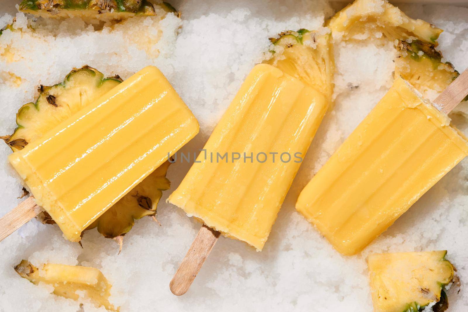 Fruit pineapple popsicle / ice cream stick focused 