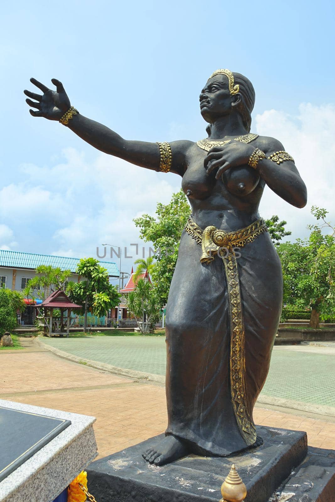 Rayong, Thailand - April 13, 2021: Statue of Nang Phisuea Samudr in Rayong province, Thailand. This is a main character in Thai poet Phra Aphai Mani was wrote by Sunthorn Phu in Thailand.