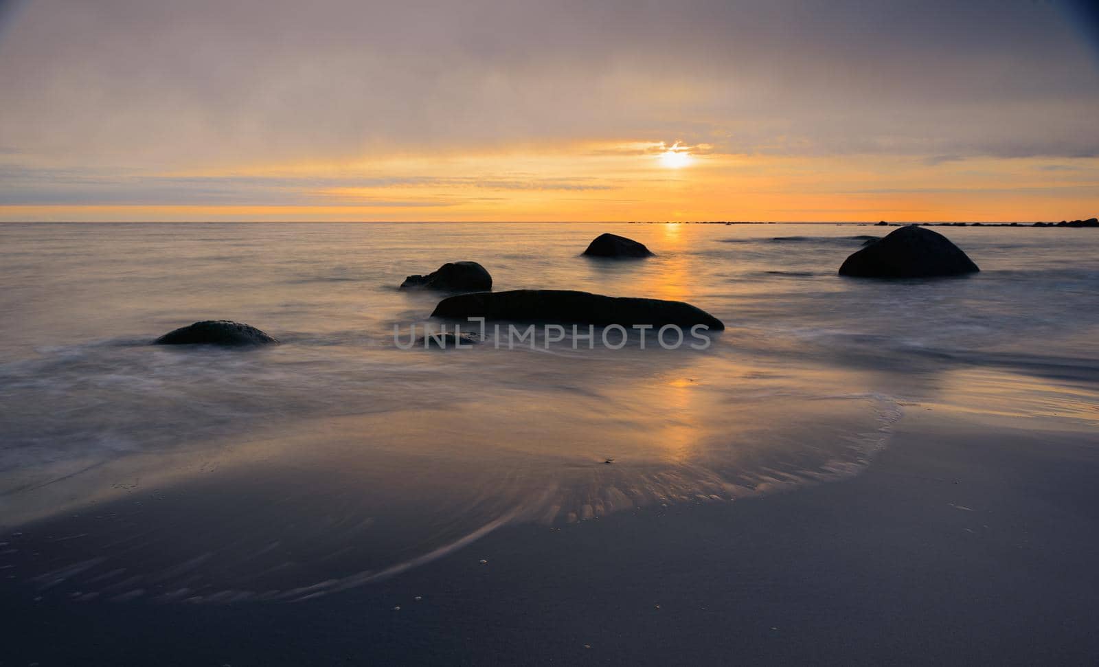 Long exposure of sunset at beach south of Stavanger, Norway