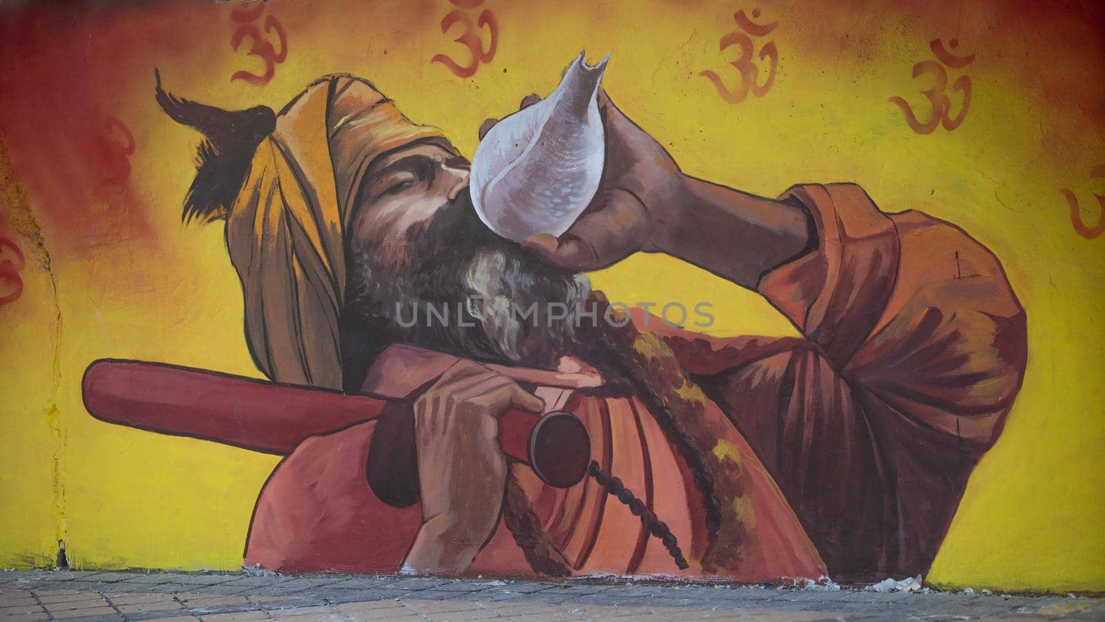 Painting of Indian Hindu religious saint at Holy city of Haridwar during largest festival of India Kumbh Mela 2021 by stocksvids