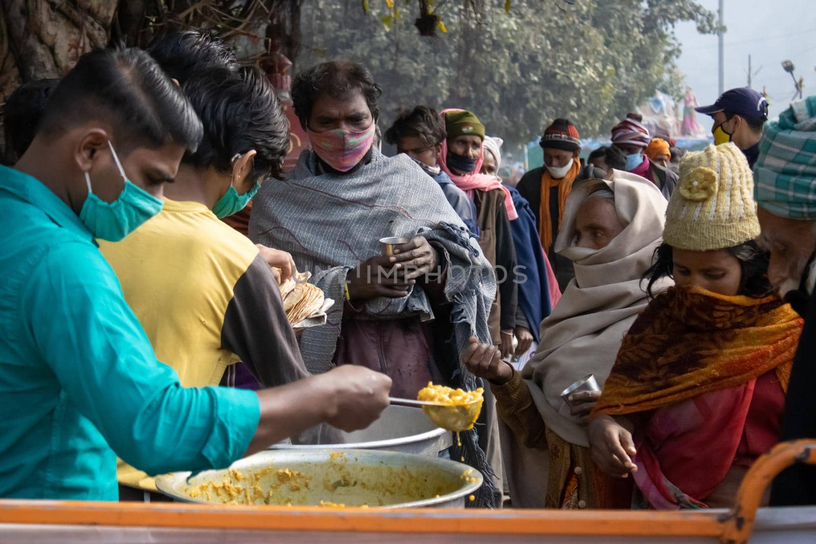 Policemen spreading awareness of protection from Coronavirus to stay safe from Coronavirus during Maha Kumbh 2021 by stocksvids