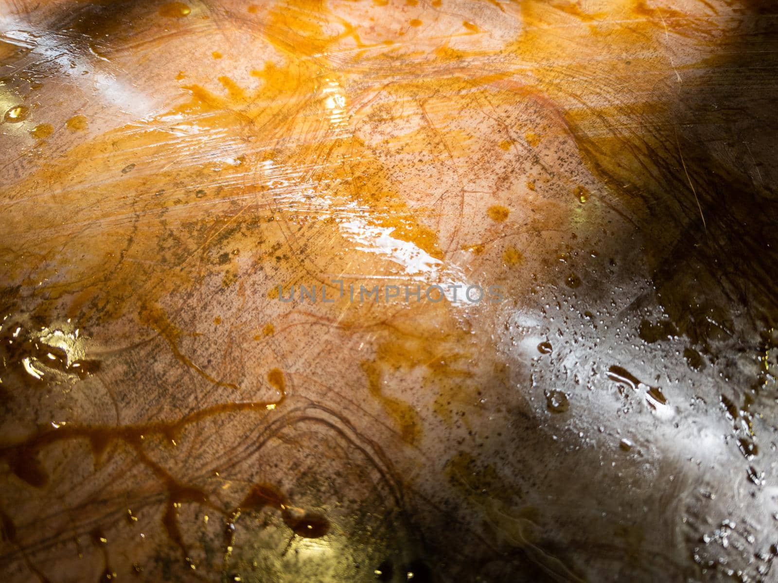 oiled burnt brown steel sheet full frame close-up industrial background