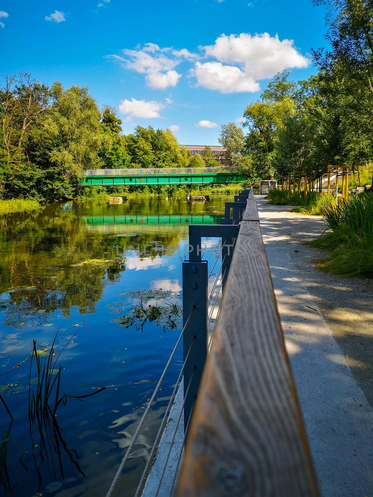 Platform with benches as relaxing area on Olawa river by Wierzchu