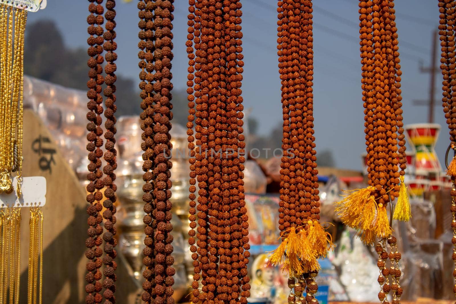 Indian shopkeeper at shop selling religious material at Haridwar Uttarakhand India by stocksvids