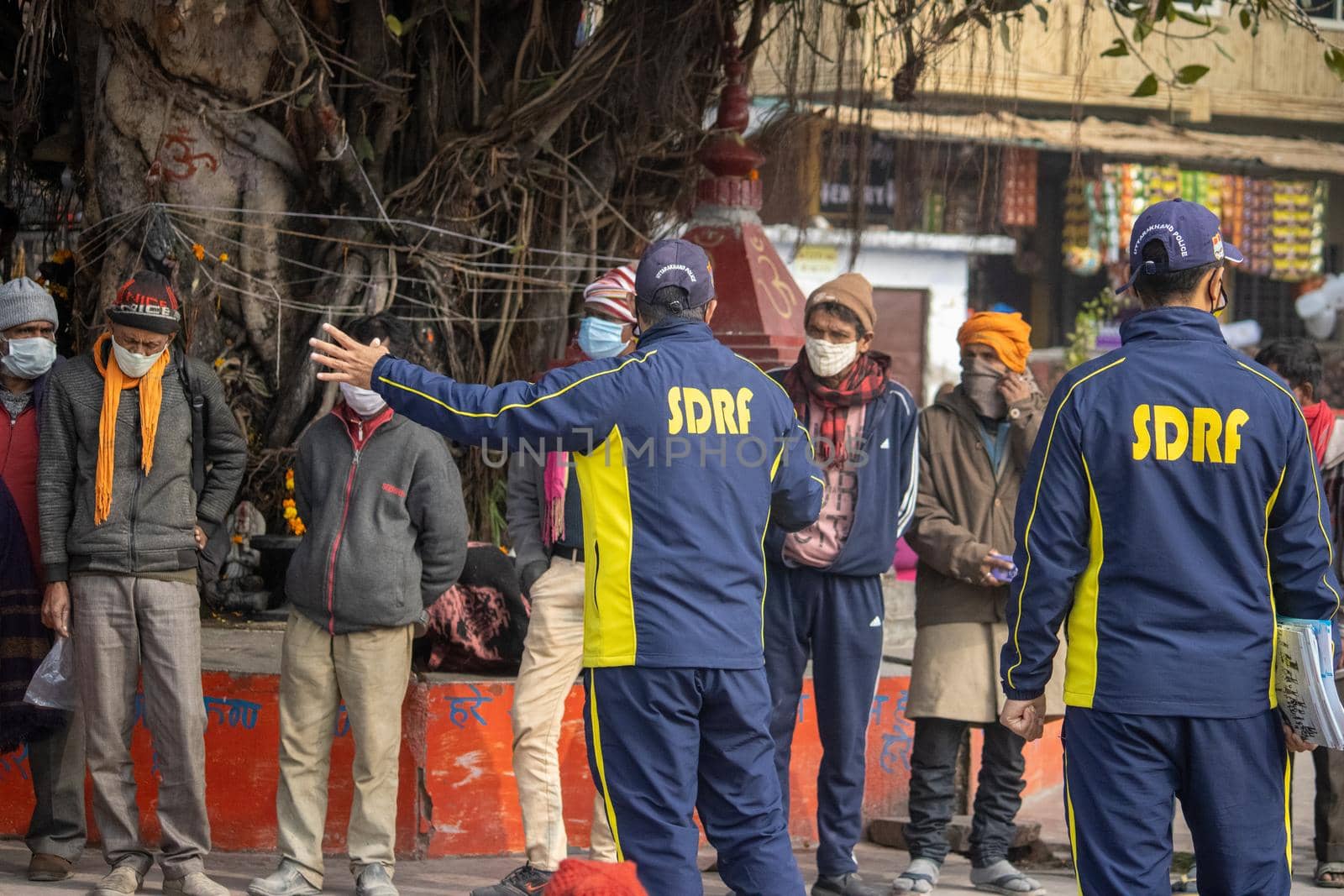 Haridwar, Uttarakhand India April 06, 2021. Policemen spreading awareness of protection from Coronavirus to stay safe from Coronavirus during Maha Kumbh 2021. Apple prores 422 High-quality 4k footage.