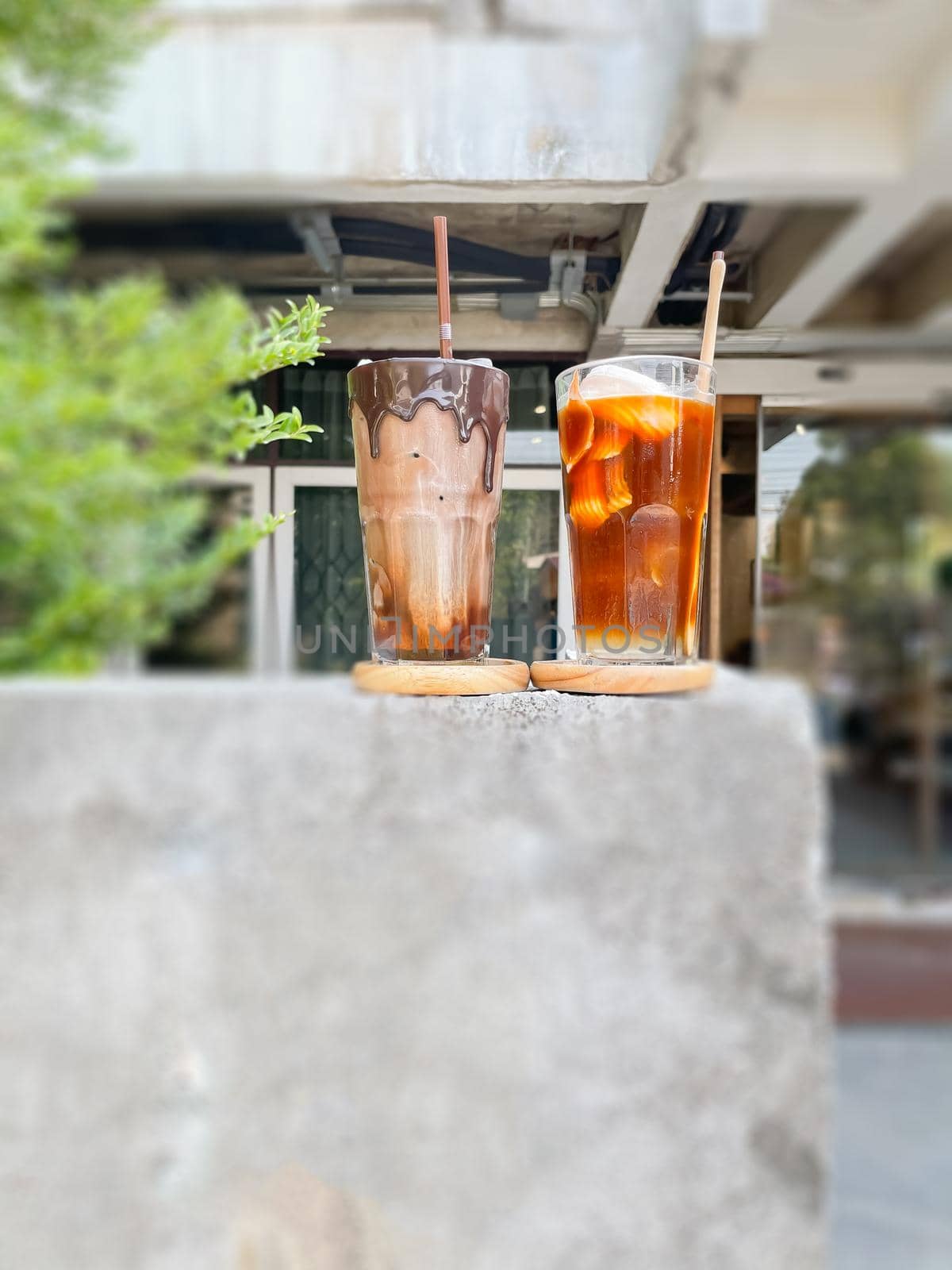 A glass of iced mocha and iced americano with coconut juice, stock photo