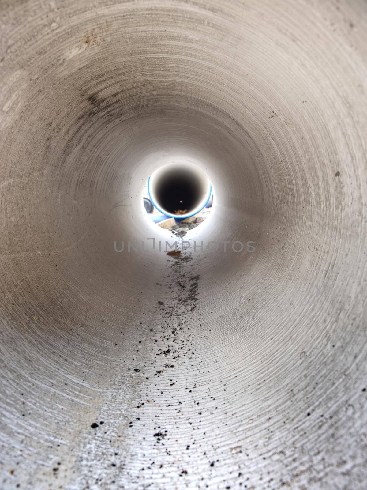 Hole in long tupe with large diameter. Water supply plastic tube.