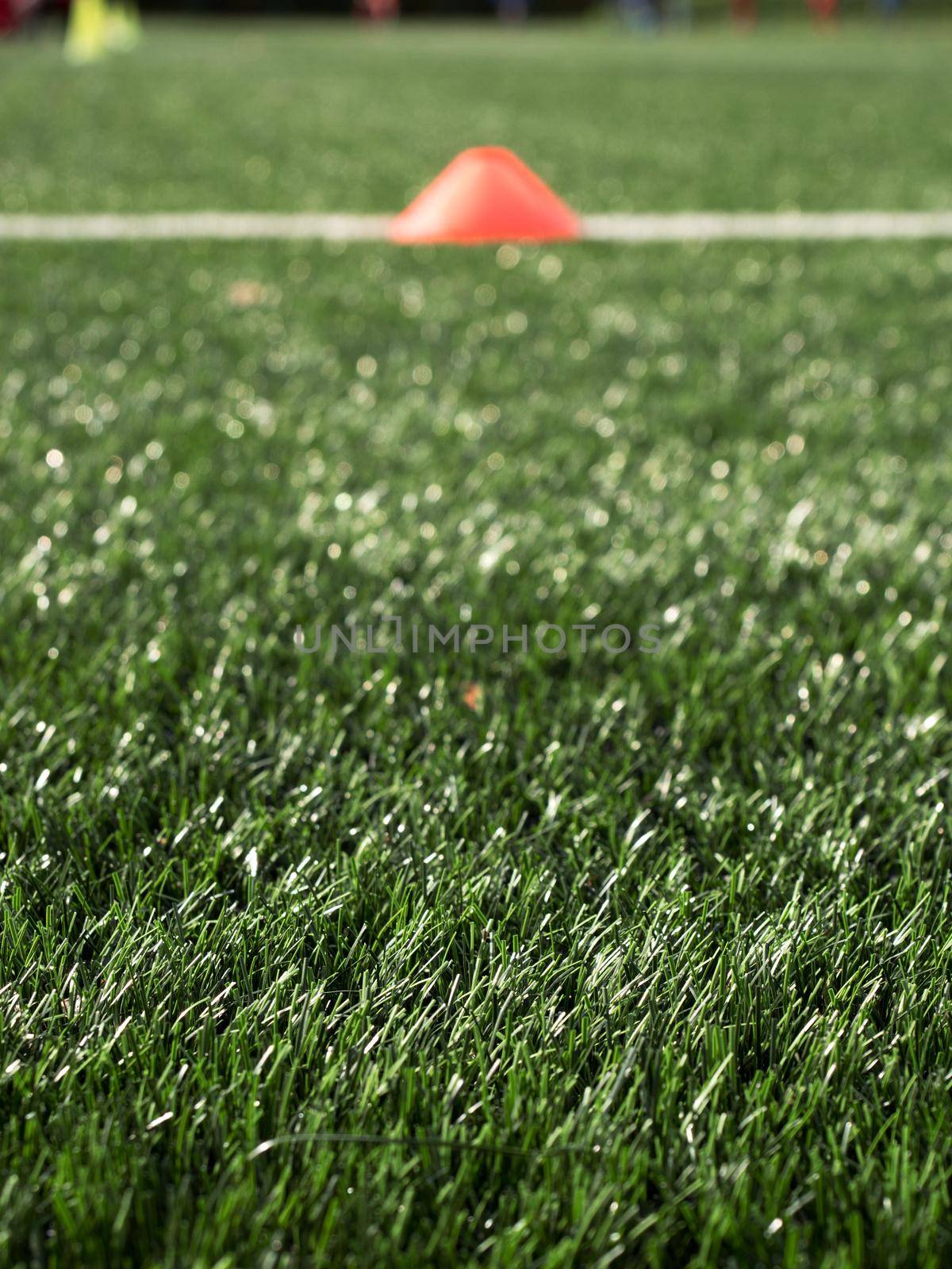 Cones are soccer training equipment on green artificial turf  by rdonar2