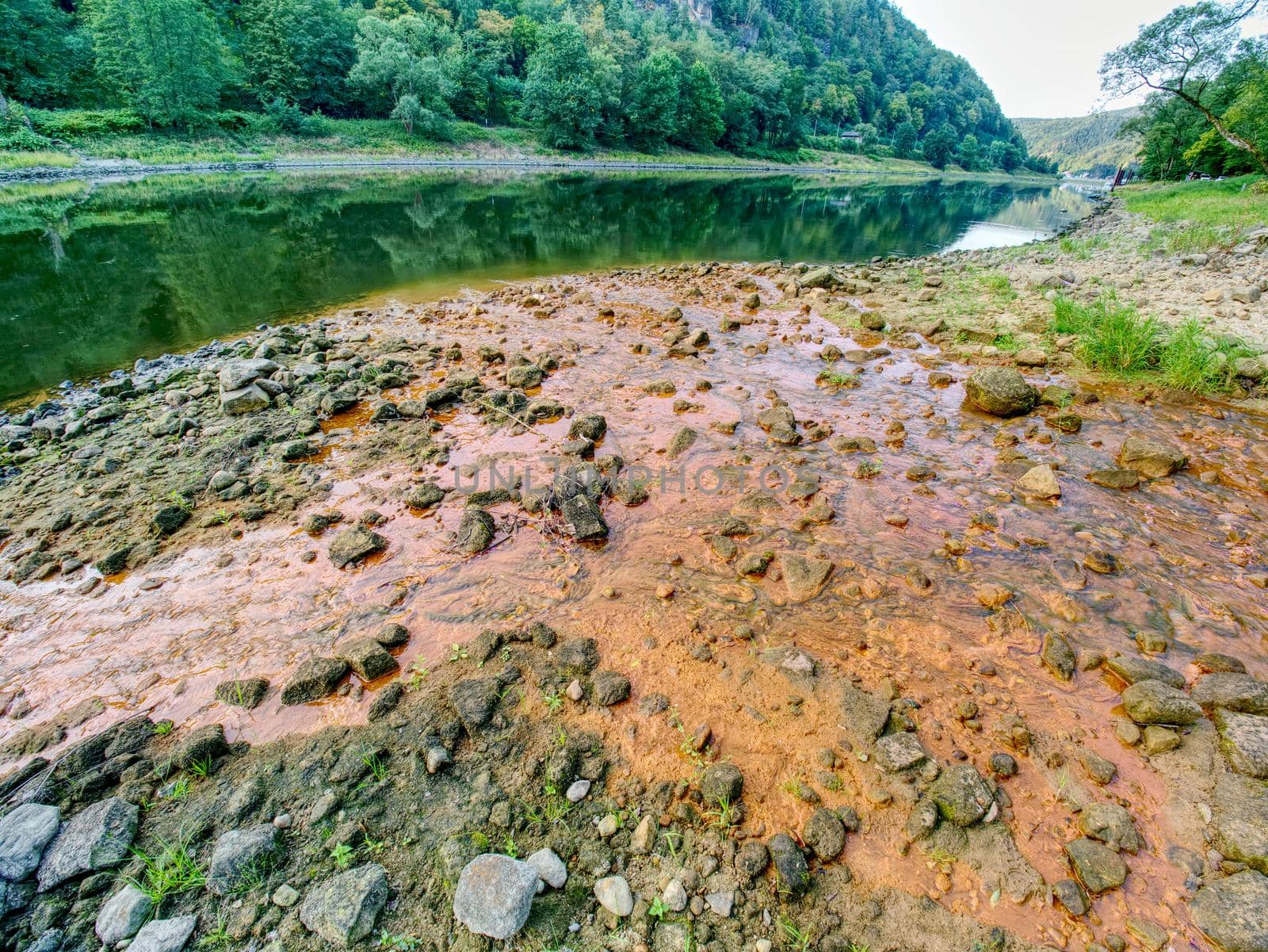 Low water level, empty river inflow. Muddy horrible smell water by rdonar2