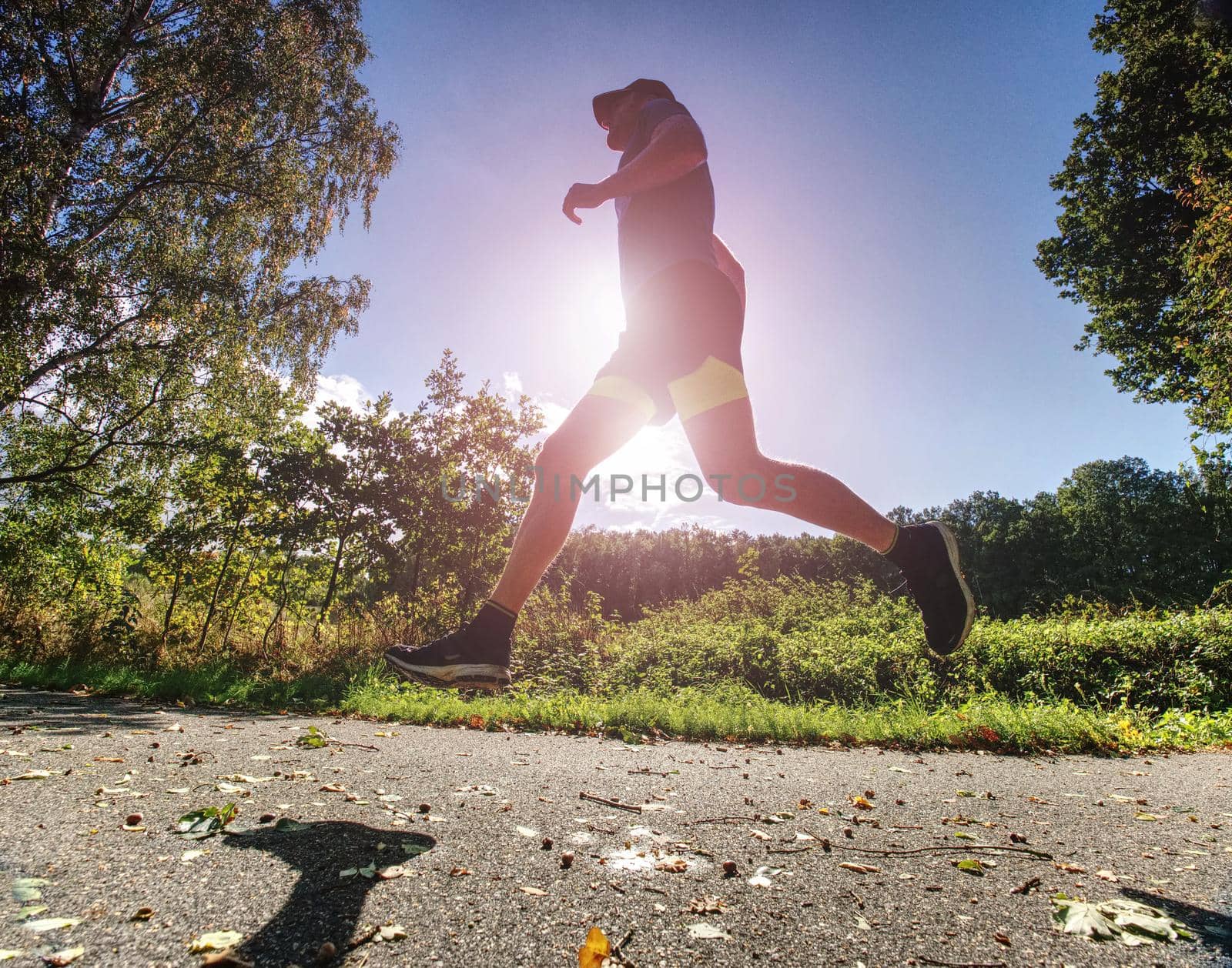 Man jogger run in park sunny day. Man is training by rdonar2