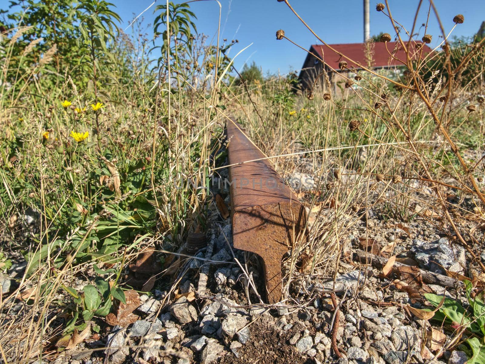 Autogen torch cut rail rod on rotten wooden sleeper. Repair of tramway. Wait for repair and reconstruction of depot.