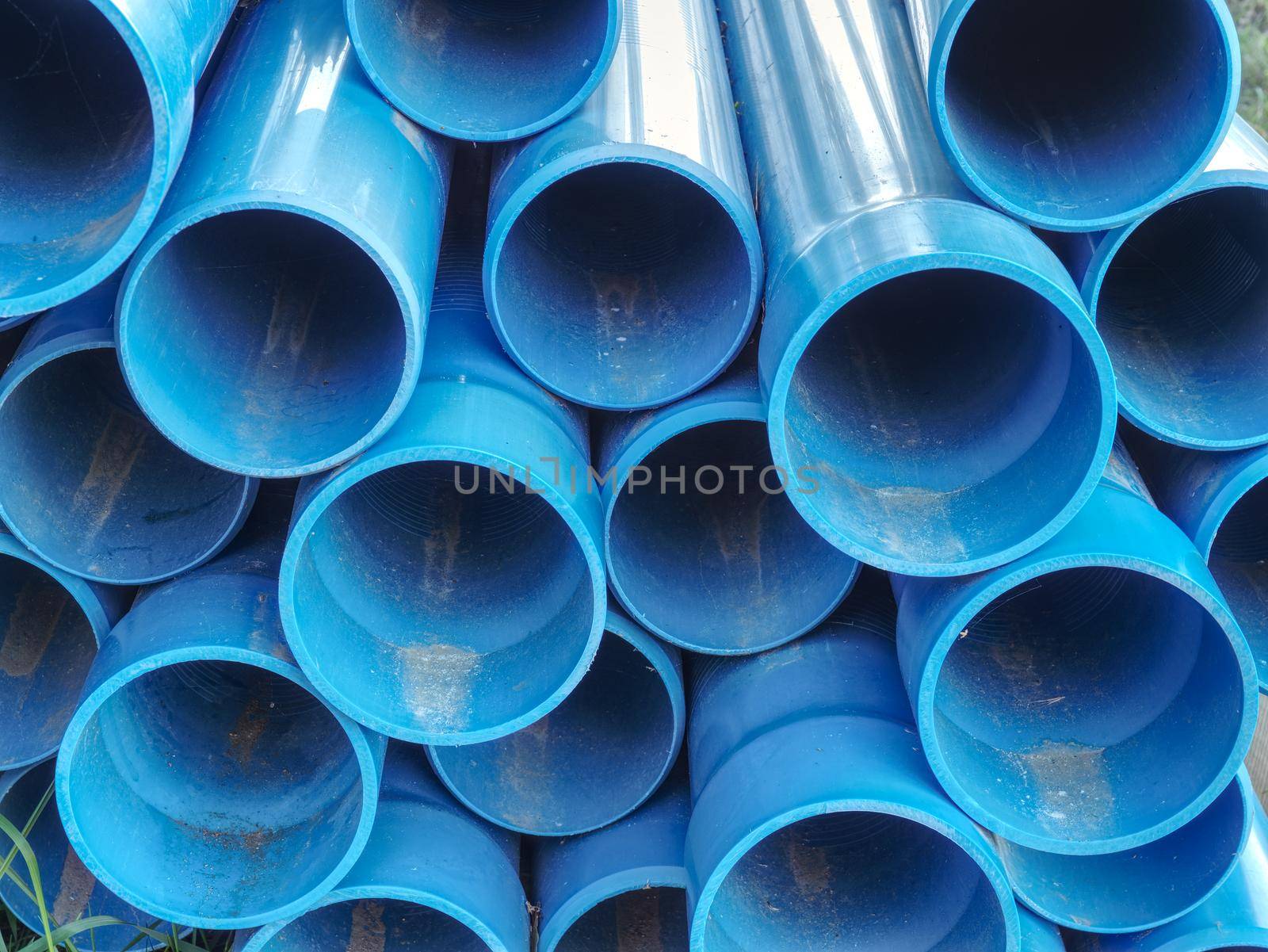 Bundle of plastic pipes ready for local water transit renewal.  Repairing process to connect drink water supply.