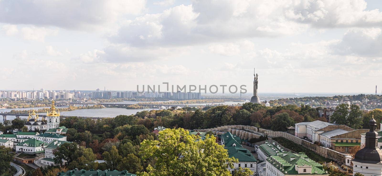 Aerial view on Kyiv city, Dnipro River, Motherland Monument and Kyiv Pechersk Lavra.