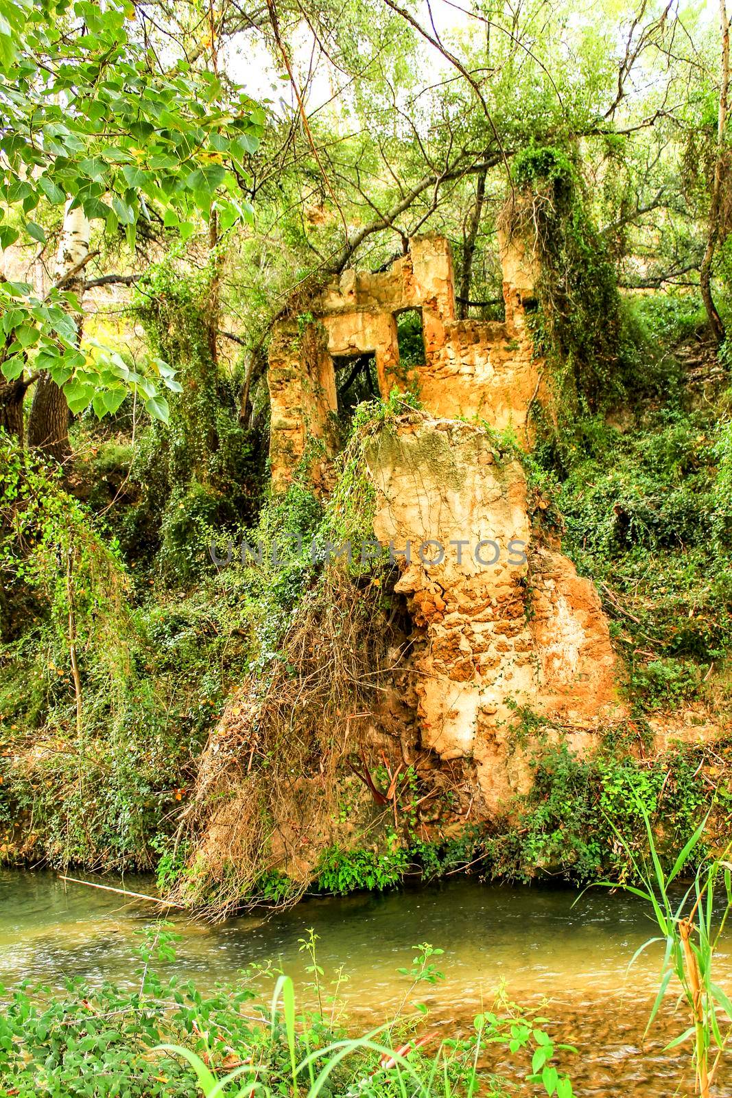 Abandoned old house by the river in Chelva, Valencia, Spain