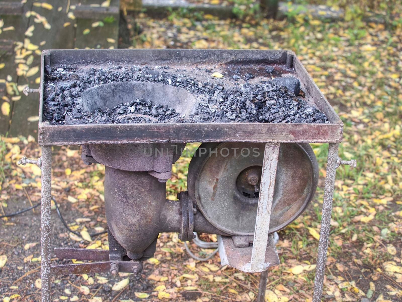 Farriers open portable furnace. Burning coal in the furnace by rdonar2