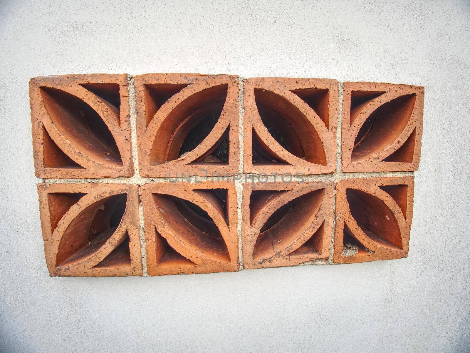 Red bricks with holes used into wall for air circulation by rdonar2