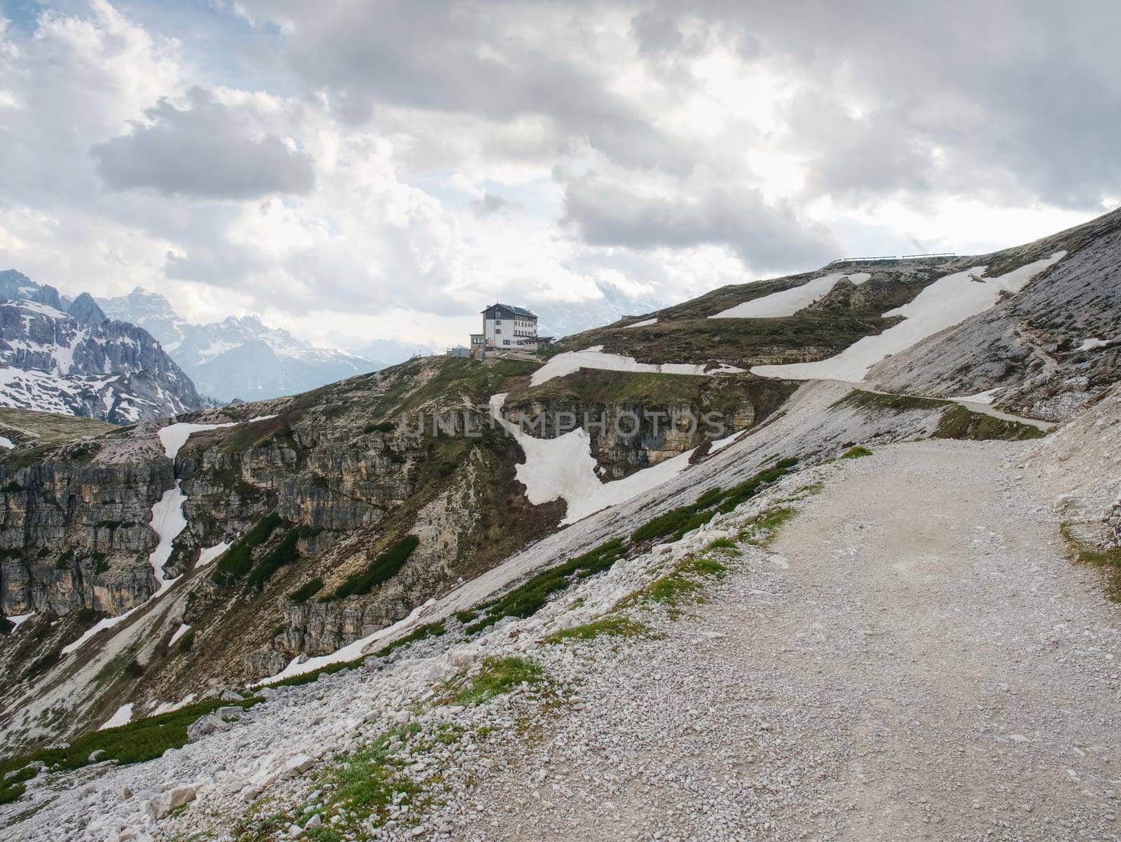 DOLOMITES, ITALY - May 26, 2018: Refugio Auronzo, Alpine hut 2333m, in Dolomites, Italy. Landmark stop for climbing the peaks of Dolomites Alps.