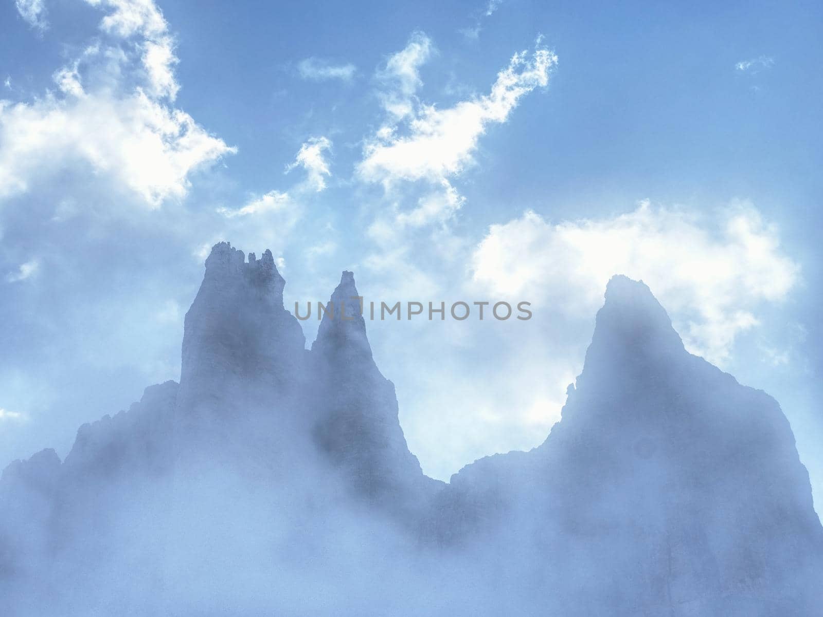 Tre Cime di Lavaredo in sunny April evening, view from tour by rdonar2