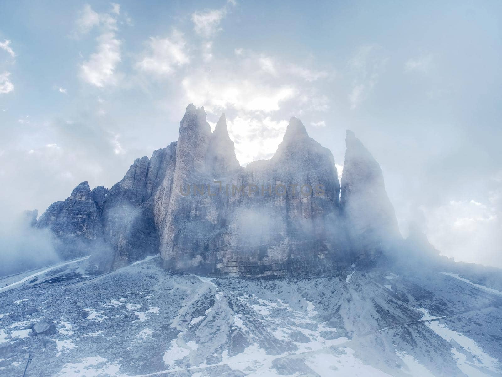 Tre Cime di Lavaredo in sunny April evening, view from tour around at sunset, Dolomite Alps Italy