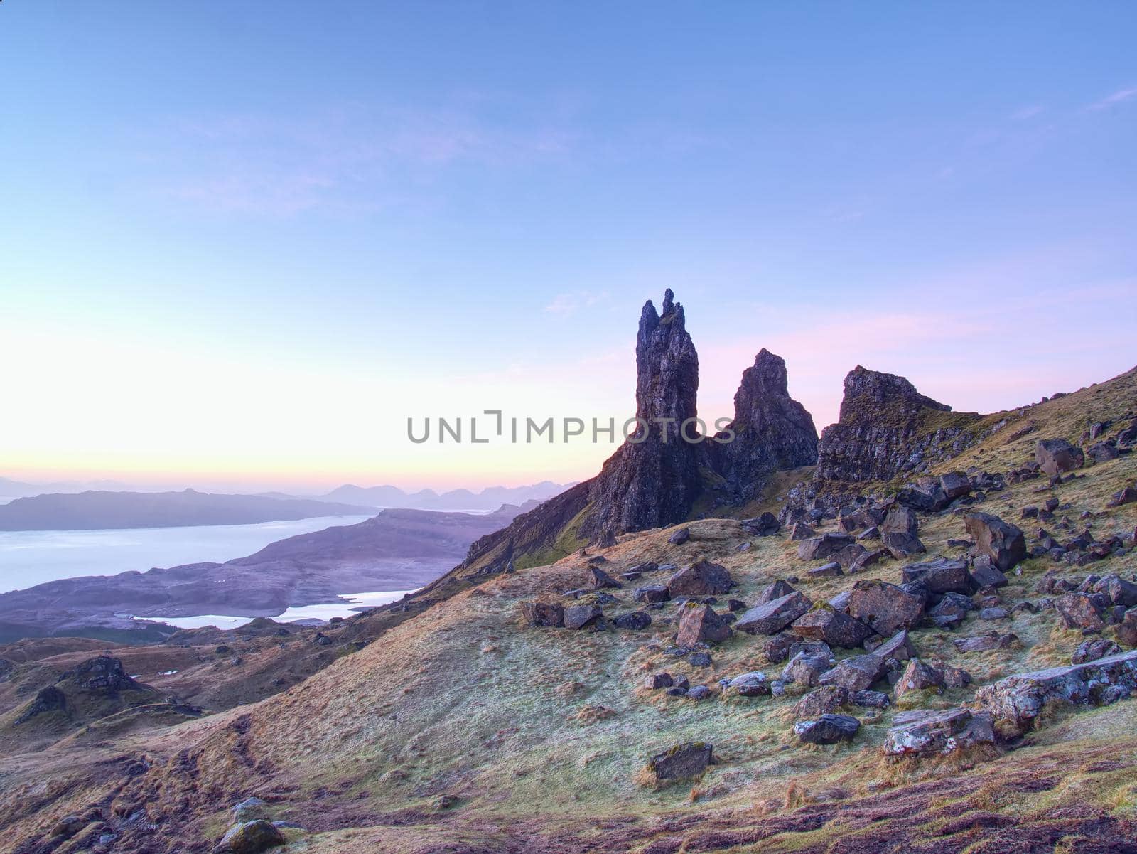 Famous exposed rocks Old Man of Storr, north hill in the Isle of Skye island of Highlands in Scotland. 