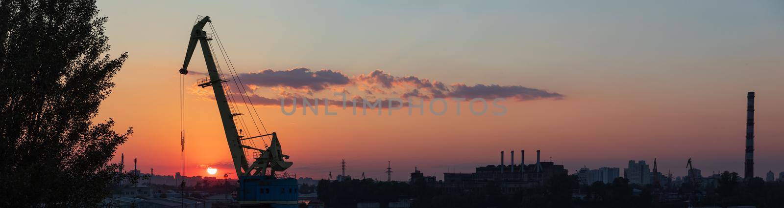 Sunset at industrial district of Kiev in Podil district by palinchak