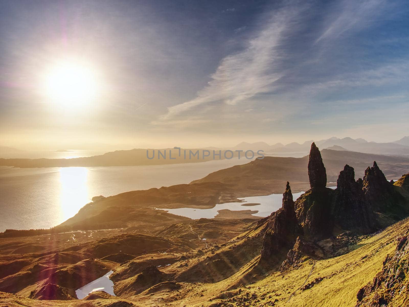 Morning view of Old Man of Storr rocks formation and lake Scotland  by rdonar2