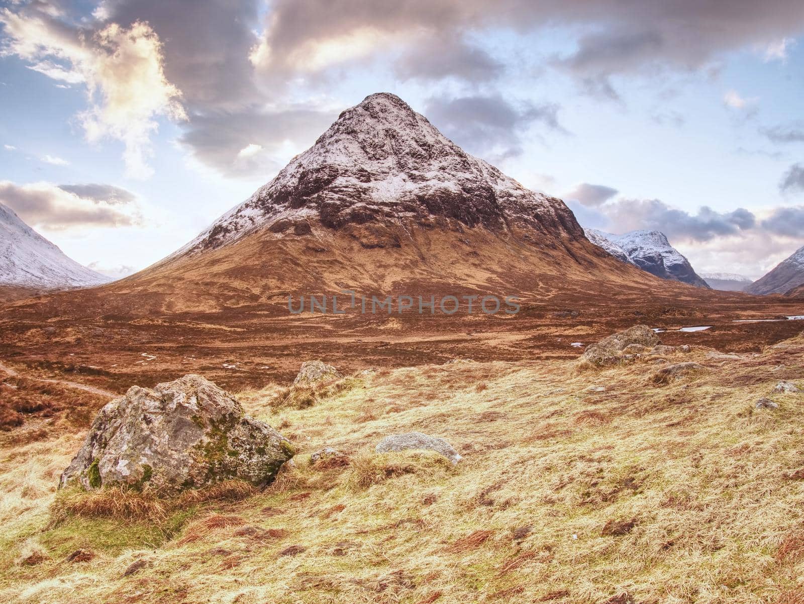 Fresh snow covered peaks of mountains in the Glencoe region of Scotland.