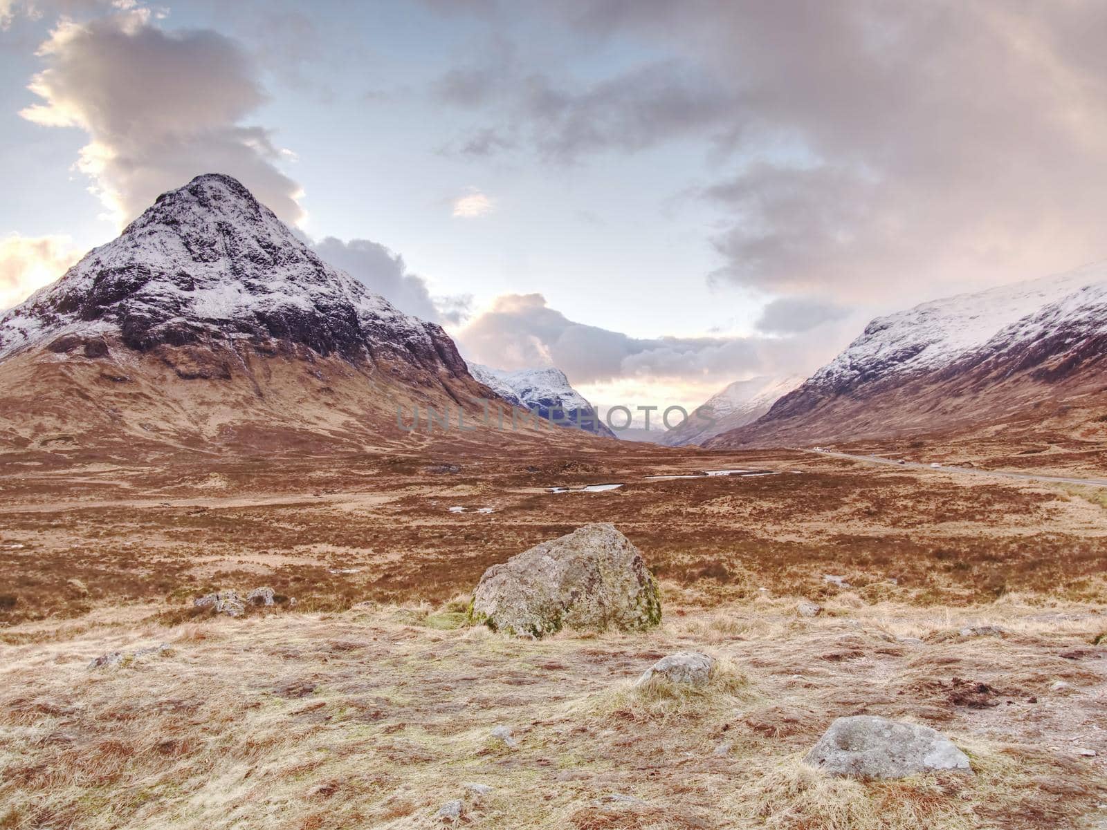 Fresh snow covered peaks of mountains in the Glencoe region of Scotland.