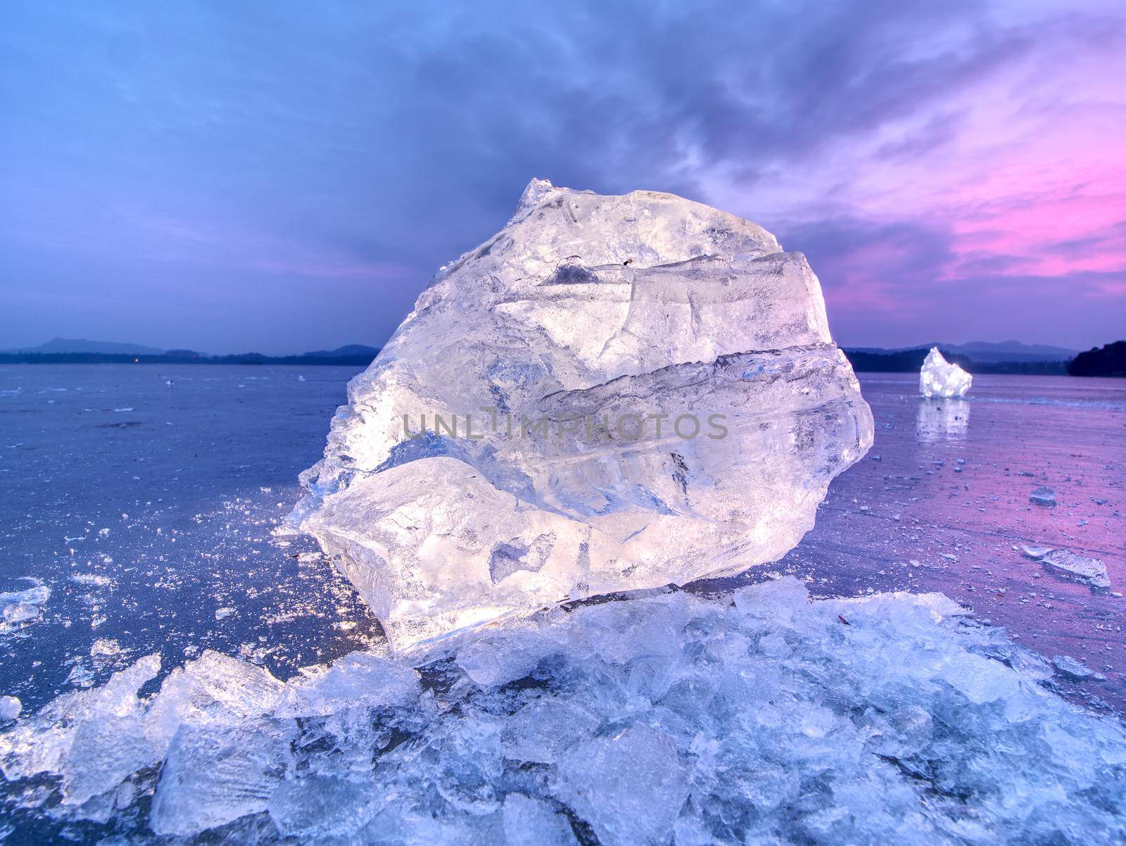 Detail view into  an ice with deep scratches and cracks. Cut floe by rdonar2