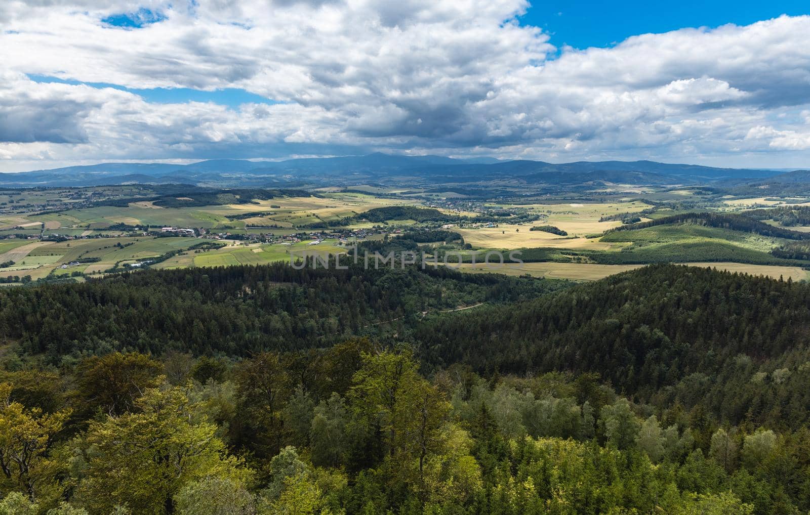 Beautiful panorama of mountains seen from top of observation tower on Trojgarb mountain by Wierzchu