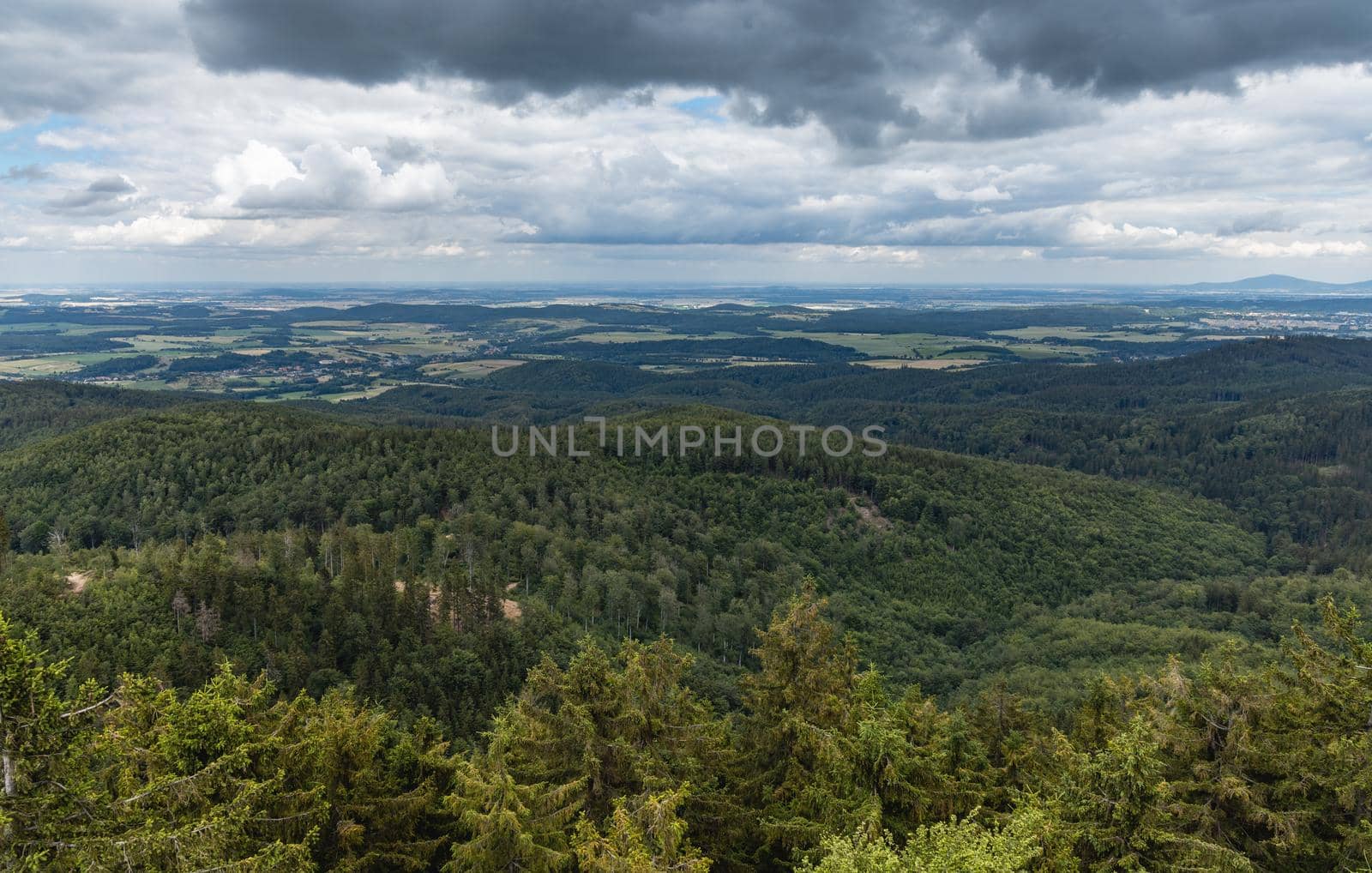 Beautiful panorama of mountains seen from top of observation tower on Trojgarb mountain by Wierzchu