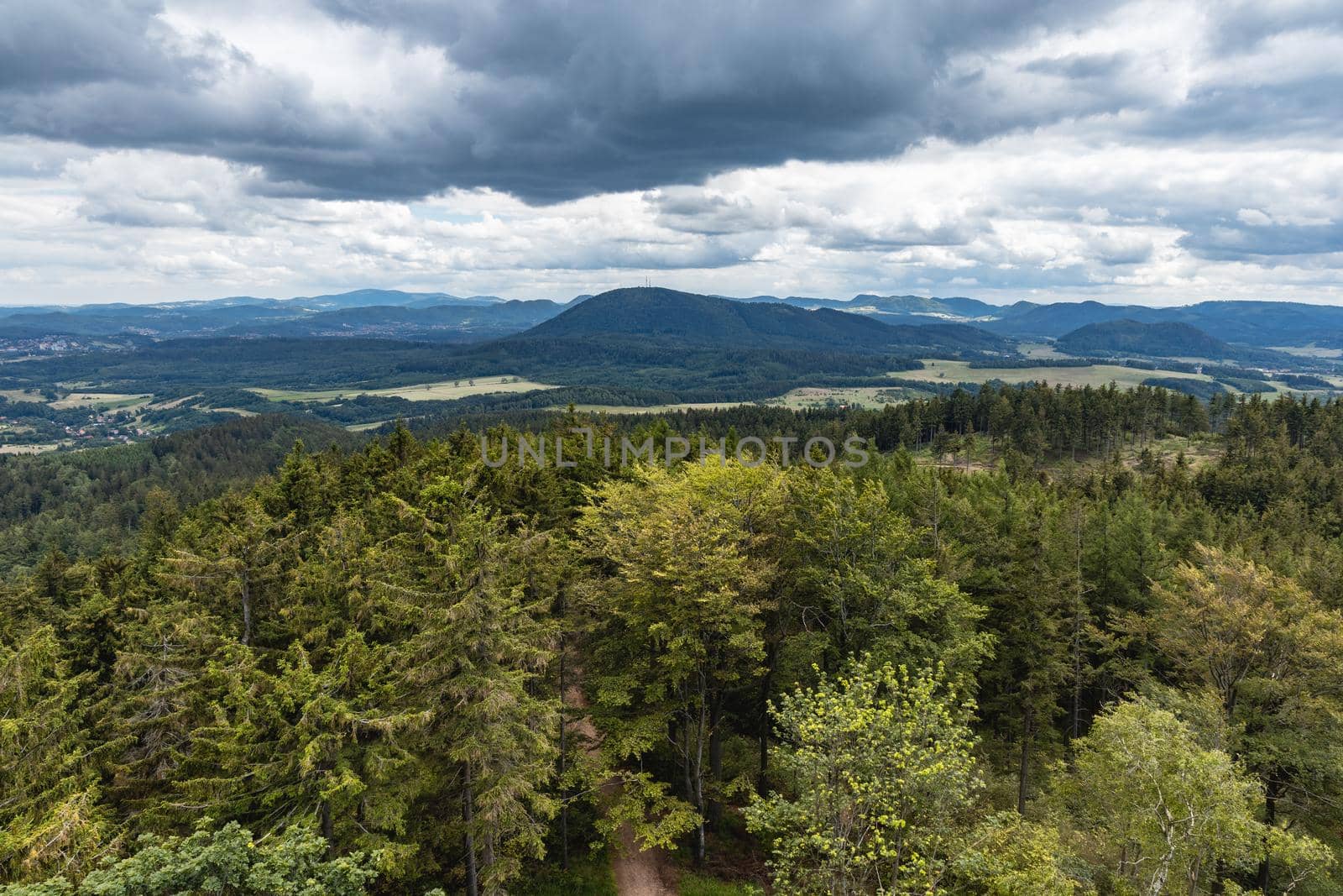 Beautiful panorama of mountains seen from top of observation tower on Trojgarb mountain by Wierzchu