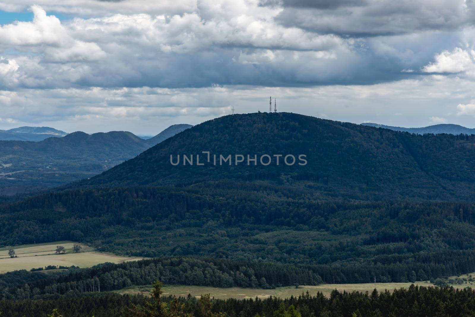 Beautiful panorama of mountains seen from top of observation tower on Trojgarb mountain by Wierzchu