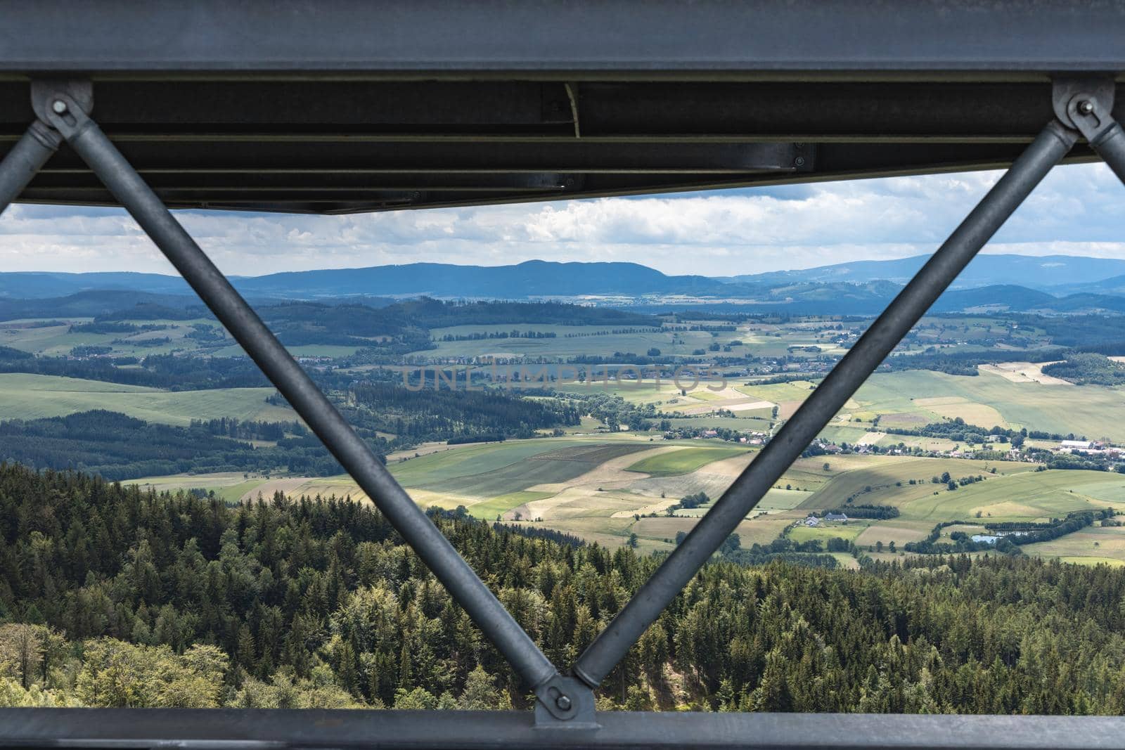 Beautiful panorama of mountains seen from top of observation tower on Trojgarb mountain by Wierzchu