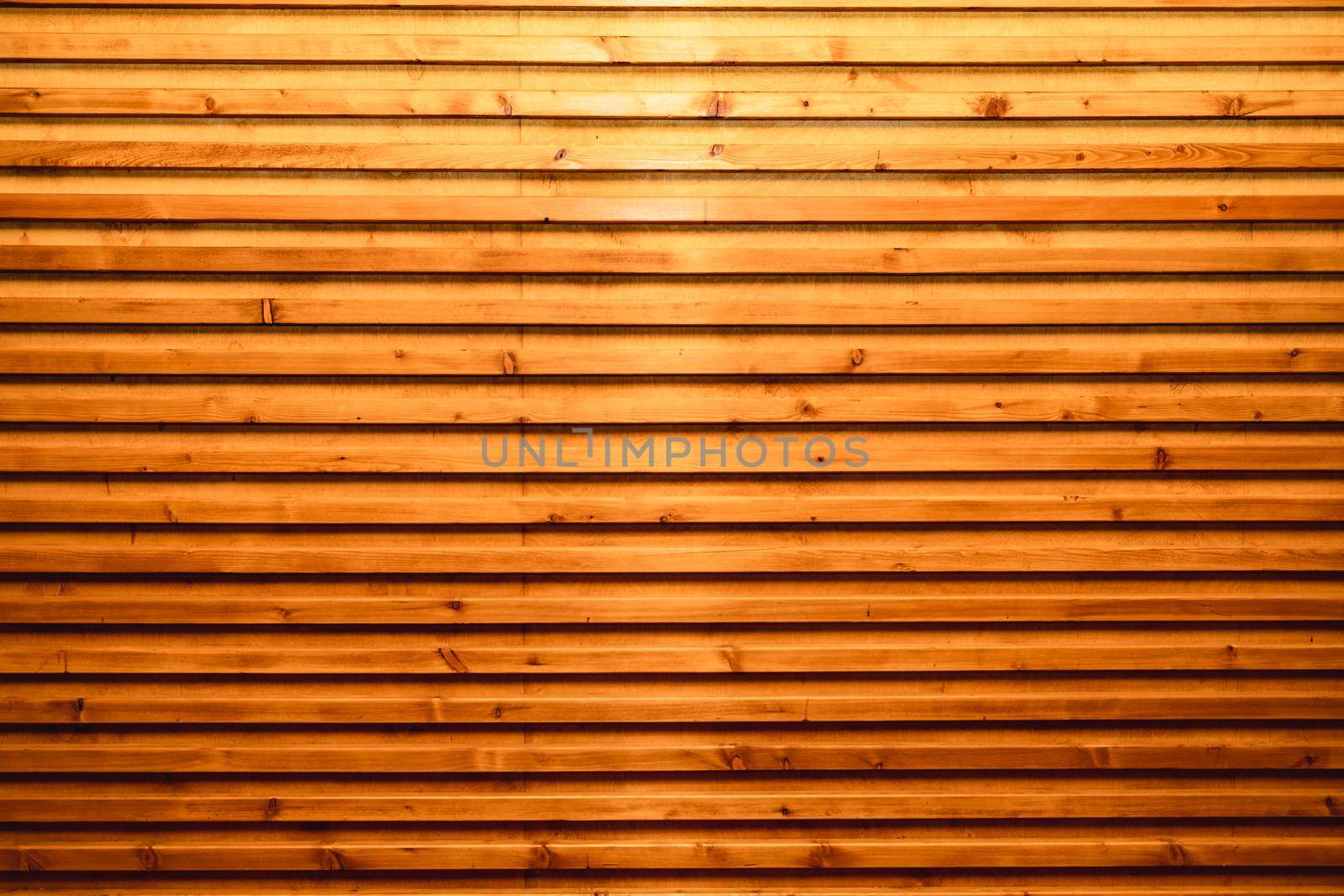 Wooden wall with long wooden slats