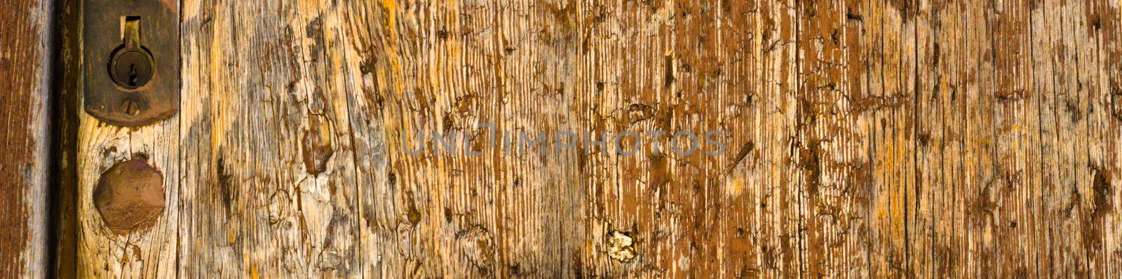 old door lock, aged wooden door, home security by Q77photo