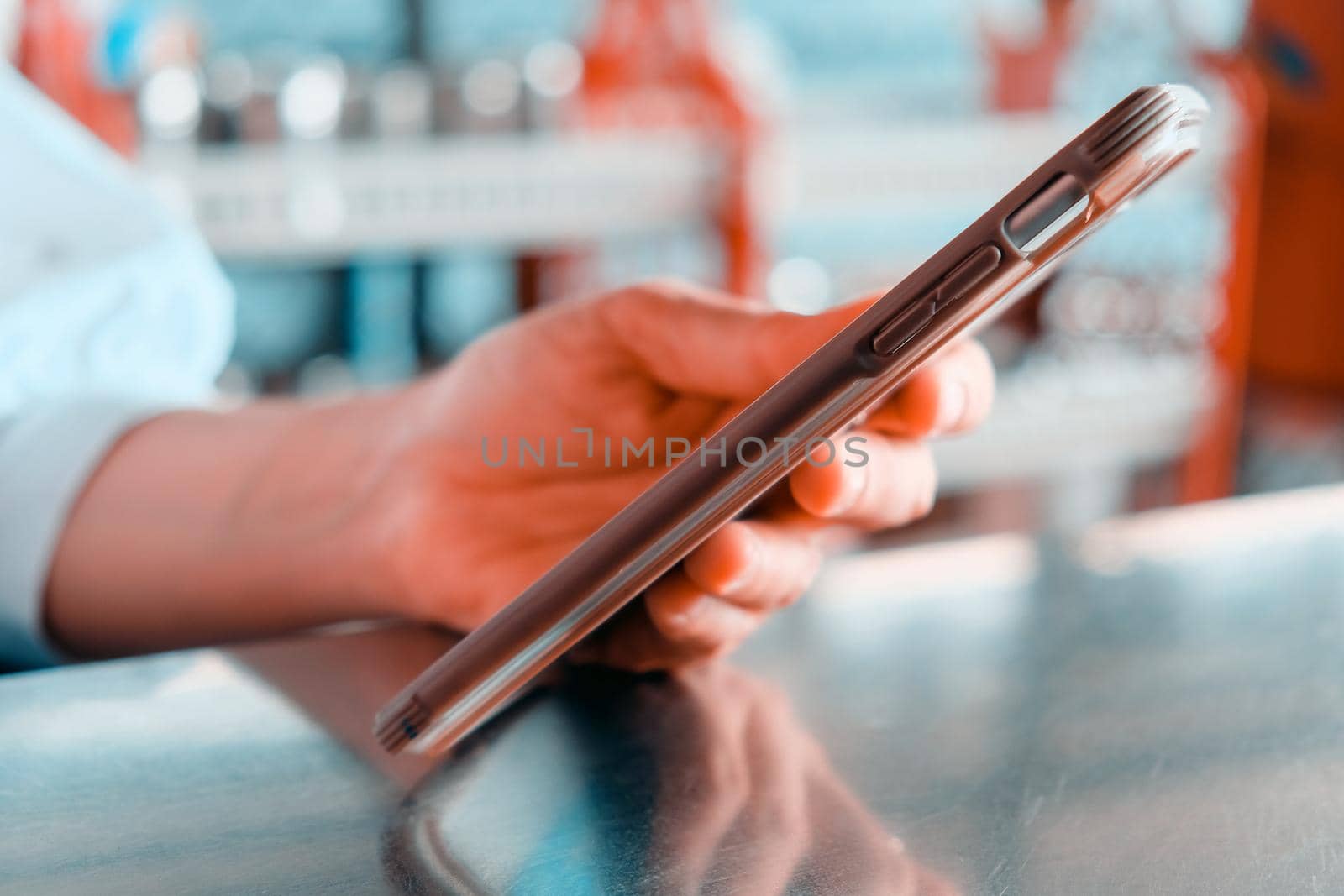 close up image of Teenage girl text messaging on her phone