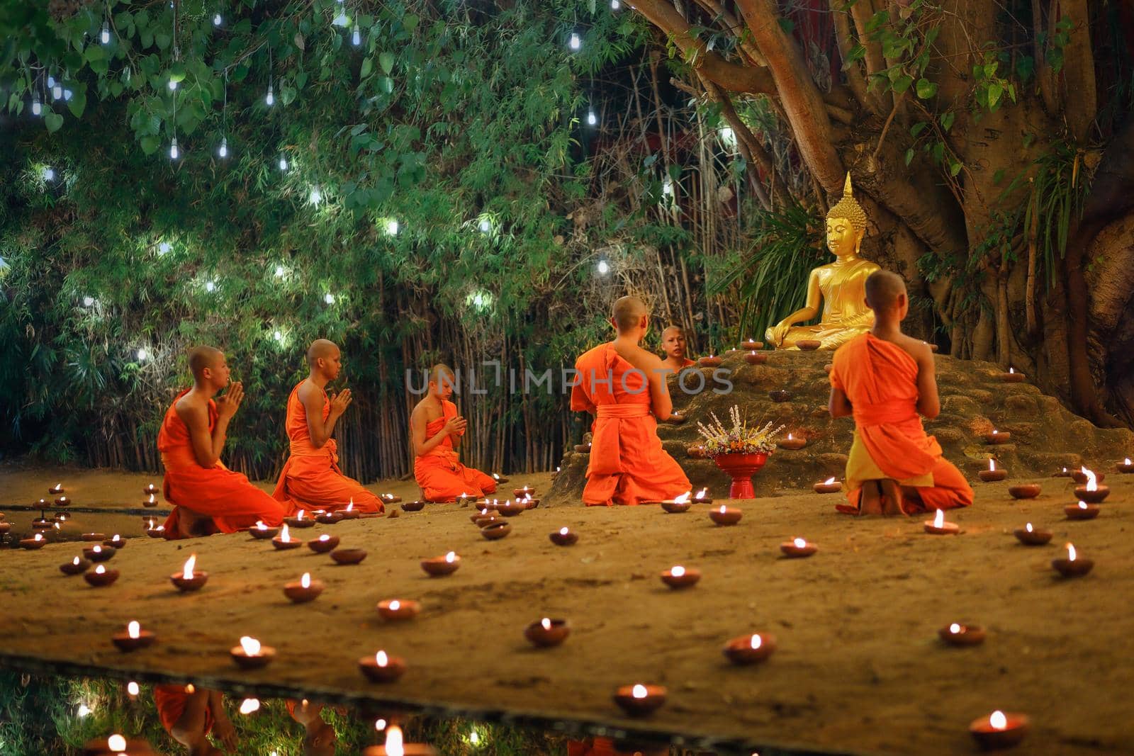 CHIANG MAI THAILAND - Feb 19 : Makha Bucha Day is the important incidents Buddhist day. Buddhist monk fire candles to the Buddha. February 19,2019 in Phan Tao Temple, Chiangmai, Thailand.