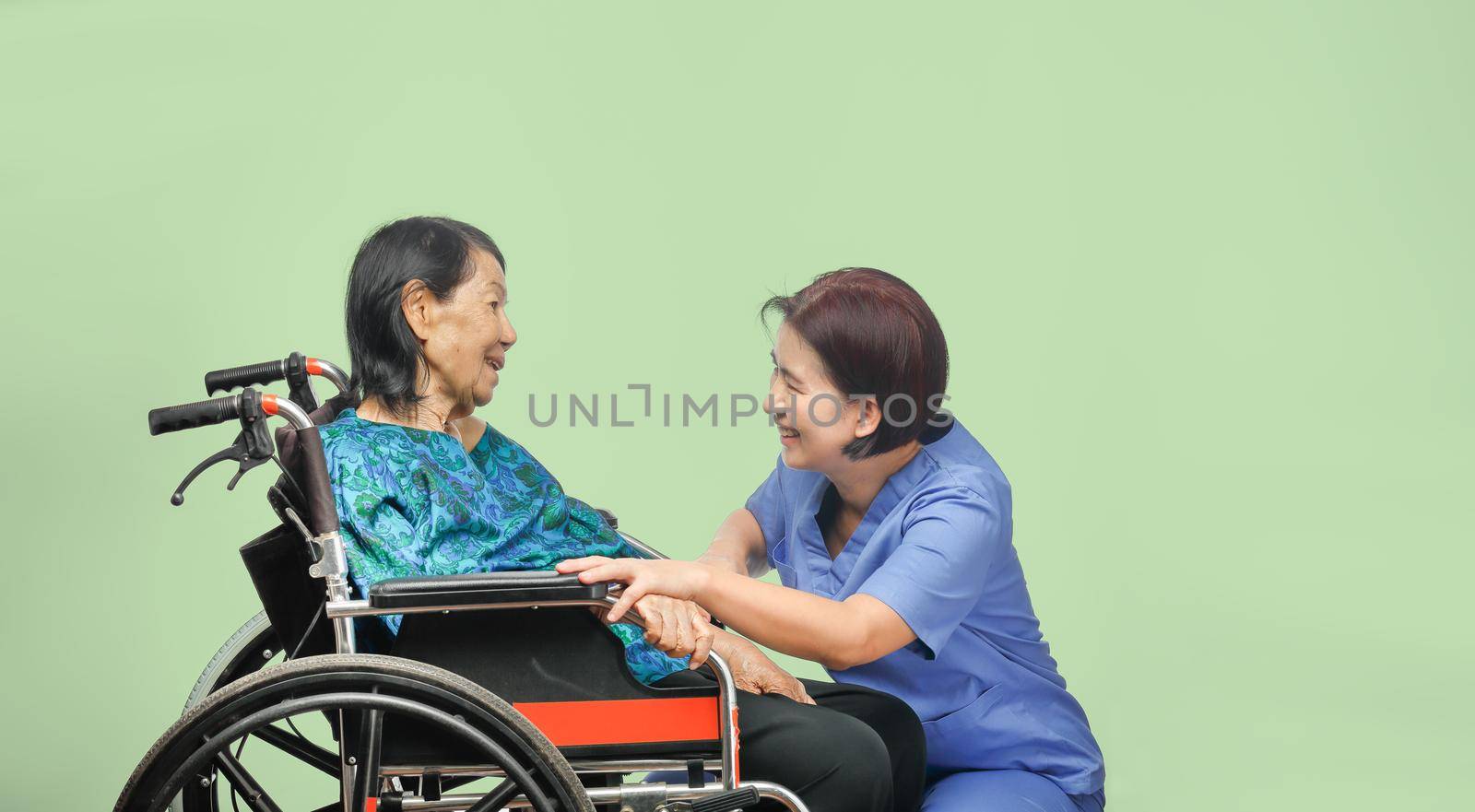 elderly woman happiness talking with caregiver