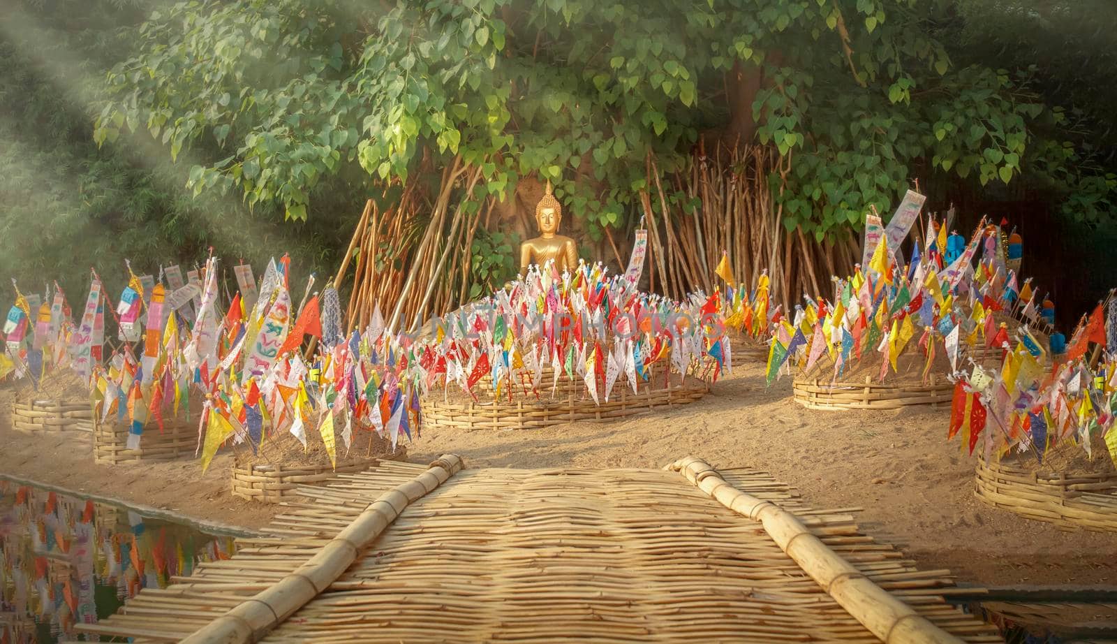 Tung or Northern thai traditional flag on sand pagoda in songkran festival.