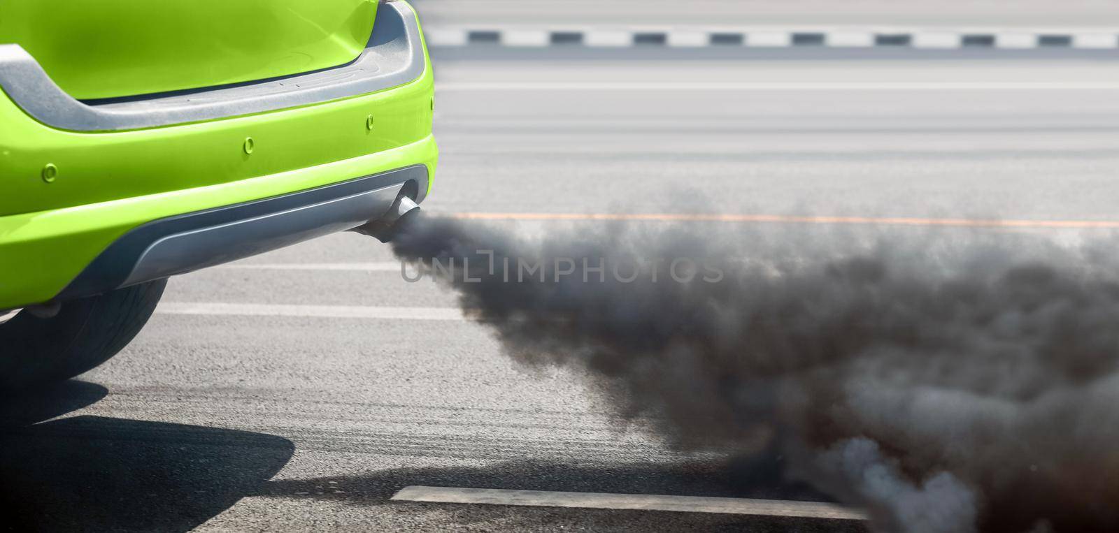 air pollution crisis in city from diesel vehicle exhaust pipe on road