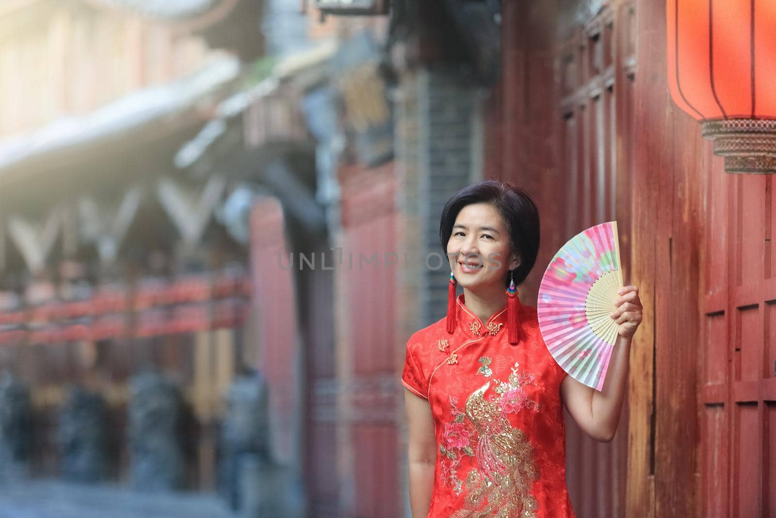 Female Tourist with Chinese Traditional Clothing in Lijiang Old town ,Yunnan, China.