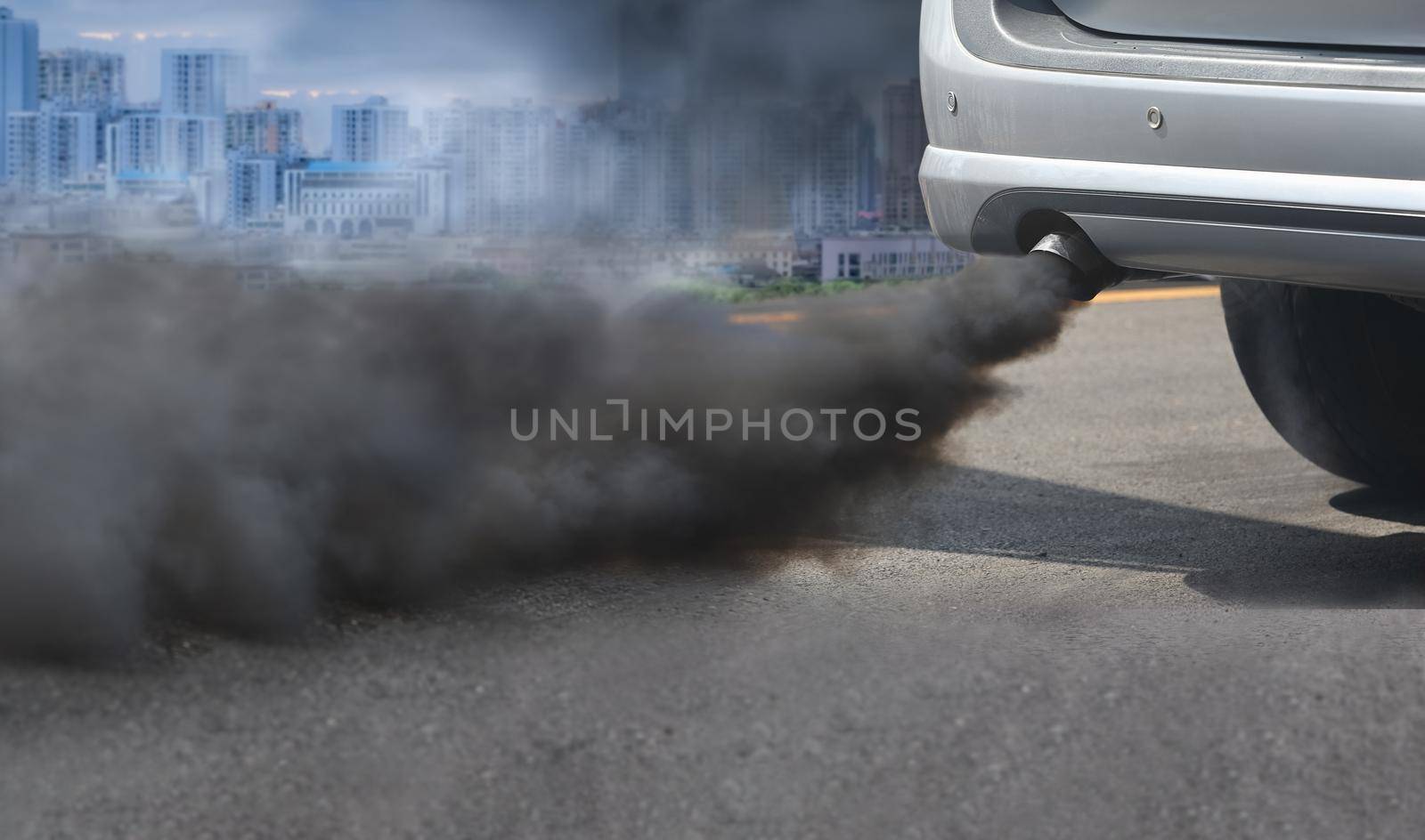 air pollution crisis in city from diesel vehicle exhaust pipe on road