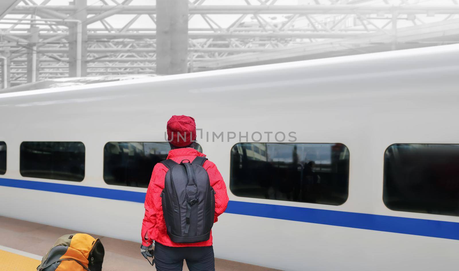 ‎Solo travelling , middle aged female tourist travel with high-speed train by toa55