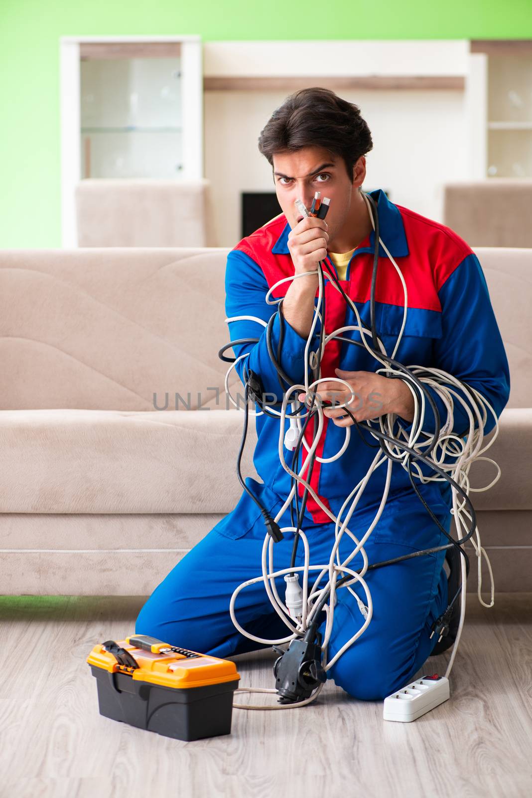 Electrician contractor with tangled cables