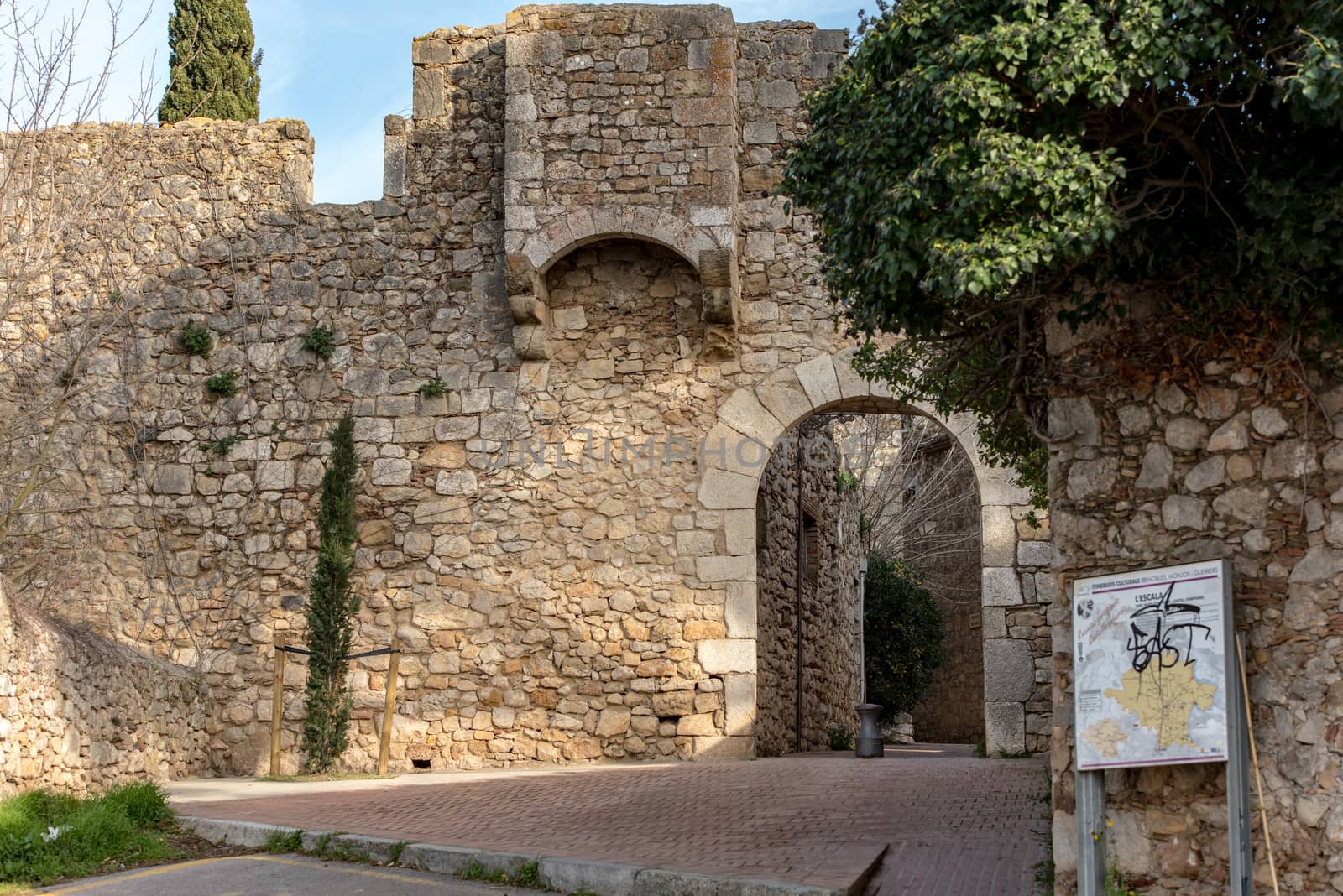 SANT MARTI D'EMPÚRIES, GIRONA, SPAIN: 2020 FEBRUARY 8: SUNNY DAY IN THE OLD CITY OF SANT MARTI DE AMPURIES, GIRONA, SPAIN