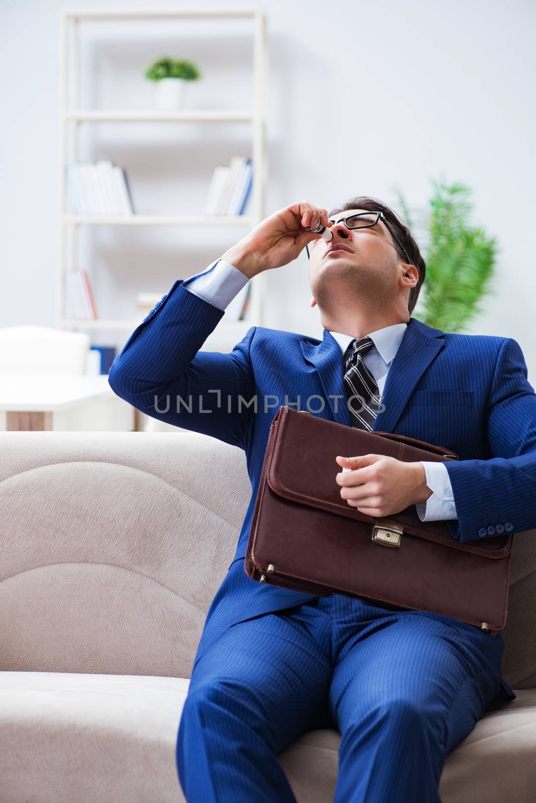 Sick employee staying at home suffering from flue